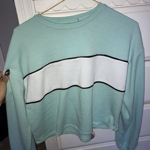 It’s A crewneck crop sweatshirt
